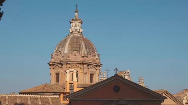 Admire the breathtaking details of an ancient dome The Church of San Carlo al Corso in Rome against the evening sky