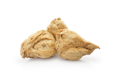 Textured soy chunks, vegetable protein for healthy life. Dry vegan meat isolated on white background.