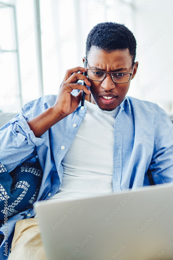 Poster angry african american hipster guy arguing with operator disappointed with bad wireless connection o