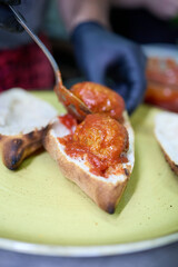 A hearty sandwich made with a pizza dough base, baked to perfection and filled with two perfectly assembled meatballs