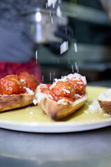 A hearty sandwich made with a pizza dough base, baked to perfection and filled with two perfectly assembled meatballs