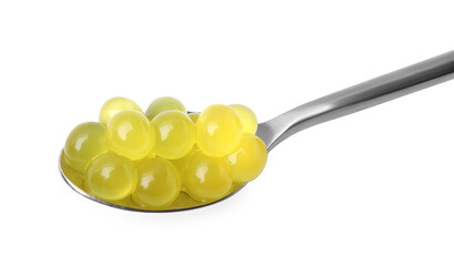 Bright tapioca pearls in spoon isolated on white