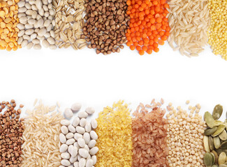 Different cereal grains, seeds and beans on white background, top view. Collection