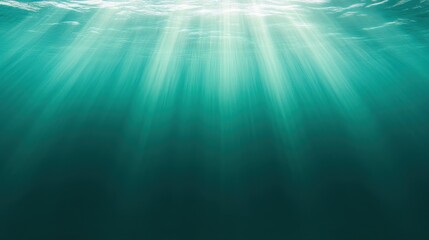 Abstract underwater background with soft light beams piercing through the water, creating a serene and ethereal atmosphere.
