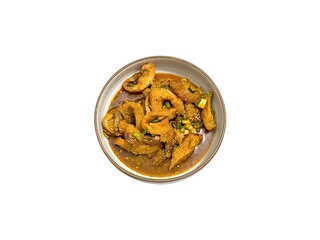 Spicy grilled pork salad isolated on white background. Namtok Moo. Thai street food. Thai northeast food. Isan dish