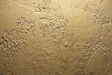 Golden brown cement rough wall texture. Abstract architectural design background