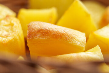 Golden roasted potatoes with crispy crust. Delightful side dish ready to eat. Macro