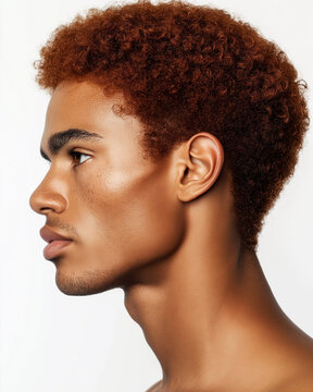 Profile Portrait of a Young Man with Curly Red Hair