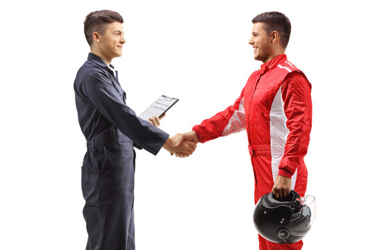 Auto mechanic shaking hands with a car racer
