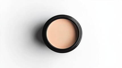 Close-up of a glossy foundation cream in a round container, viewed from above. Smooth texture, no logo or branding. Minimalist white background.