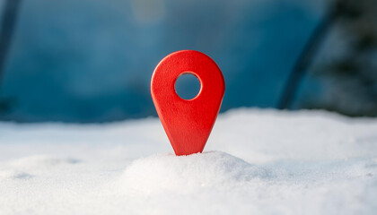 Red location pin on white snow. Winter season. Travel and nature concept. GPS, guidance, direction