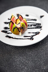 figs baked with cheese camembert or brie fresh meal food snack on the table copy space food background rustic top view keto or paleo diet vegetarian vegan food