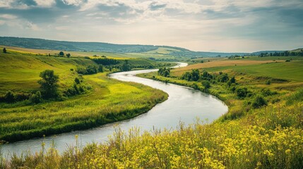 Winding river in scenic grassy valley