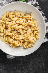 spaetzle egg pasta shape fresh meal food snack on the table copy space food background rustic top view