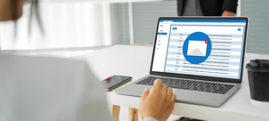 Email notification message showing on computer screen snugly. Digital marketing message information text from business to customer client