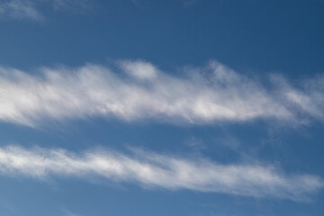 Blue sky cirrus clouds.