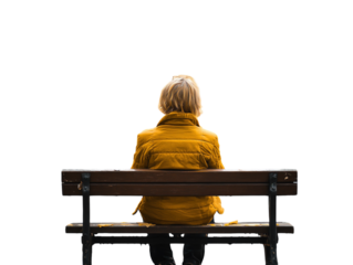 Solitary figure sitting on a bench in an autumn park, viewed from behind.   PNG transparent.