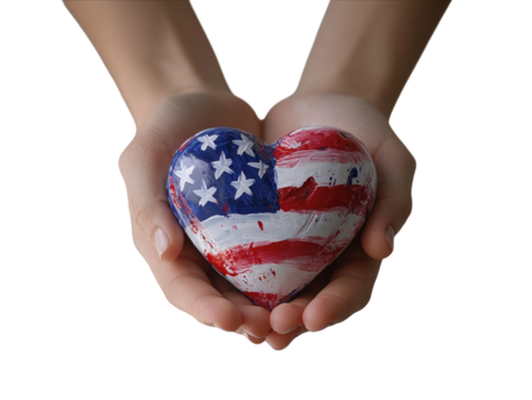 Heart-shaped object painted with the American flag held in hands.   PNG transparent. - Powered by Adobe