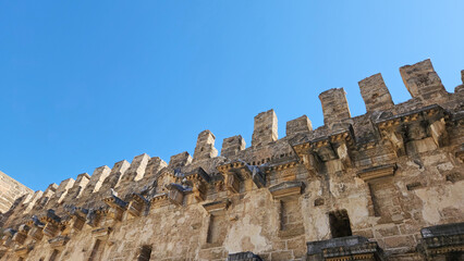 Fototapeta premium Details on the upper part of the southern wall of the Aspendos Ancient Theatre
