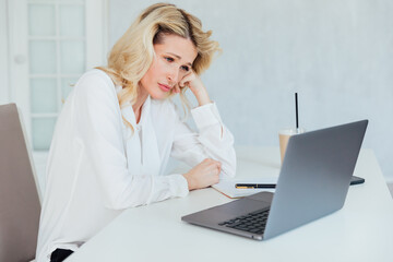 Business Tired Woman Using Laptop In Office