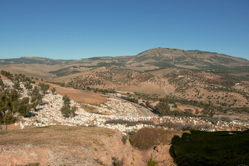 Obraz premium View of a cemetery in Fes from the top of the mountain. Morocco.