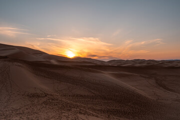 Sunset over the sand dunes of Merzouga, Morocco.