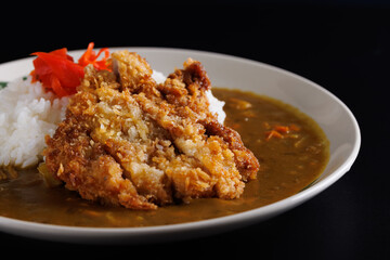 Tonkatsu curry japanese food isolate in black background