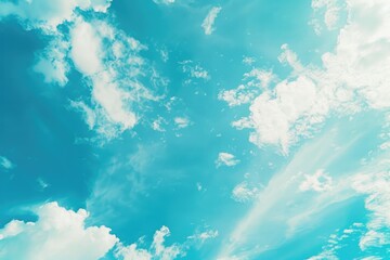 Airplane soaring through the clouds with a clear blue sky