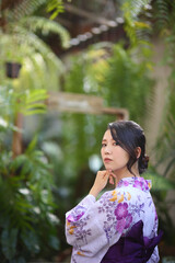 portrait woman with yukata dress in the garden
