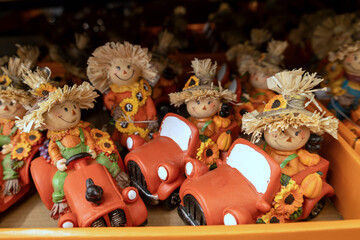 Charming collection of small scarecrow figurines embody the warmth and joy of the autumn season, perfect for Thanksgiving and harvest-themed celebrations