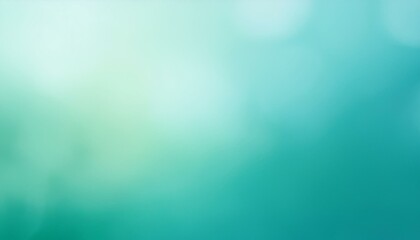 Obraz premium Cool mint green blurred background transitioning into a pale sky blue