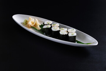 Kappamaki Cucumber Sushi Roll Japanese food isolate in black background