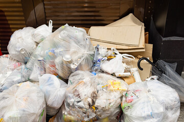 Mixed garbage collected in a city dumpster. Shot in japan