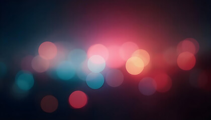 Blurred multicolor abstract lens flare on dark background. Defocused glow effect.