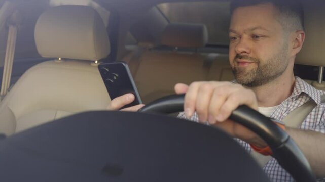 Dangerous driving leads to car accident. Reckless man driving and using smartphone instead of looking at road, causing collision