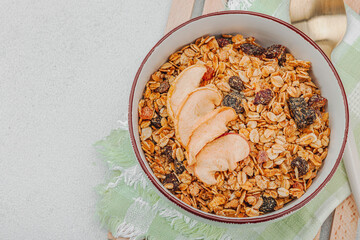 Vegan bowl with cereal granola with dried fruits. Ready to eat food, healthy breakfast concept