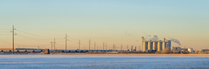 farming and industrial landscape in northern Colorado at Windsor in winter scenery