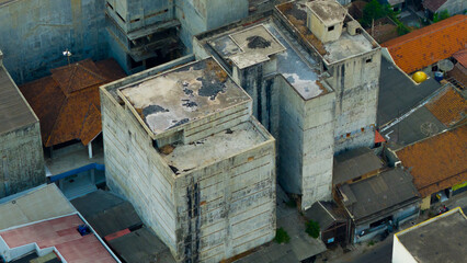 Aerial view capturing the raw industrial charm of weathered buildings amidst an urban landscape