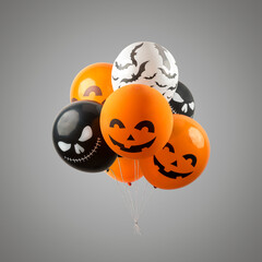 Different Halloween balloons on bright background. Minimal holiday concept.