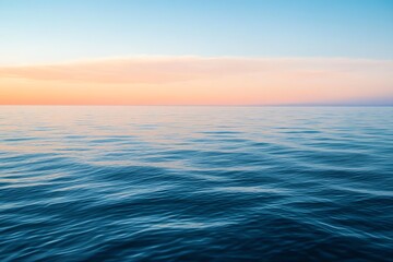 Serene ocean view with gentle waves under a vibrant sunset sky, capturing the tranquil beauty of nature in its purest form.