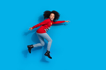 Photo of cheerful optimistic woman wear red stylish clothes store mall discount isolated on blue color background