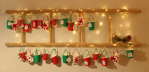 Advent calendar hanging on wall in room