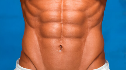 Close-up shot of toned abs. Created with Generative AI tools