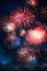 Obraz premium Colorful fireworks of various colors over night sky