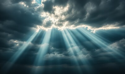 Fototapeta premium Rays of sunlight through dark clouds in the sky