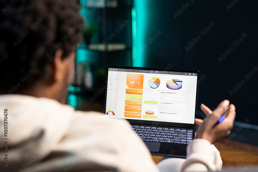 Poster remotely working accountant at home doing math calculations using financial graphs on laptop. self e