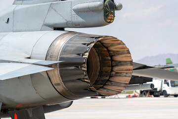 The exhaust of the fighter jet. Jet plane nozzle