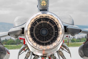 The exhaust of the fighter jet. Jet plane nozzle