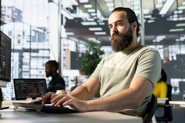 Programmer conducting experiments and tests to optimize machine learning models for performance and...