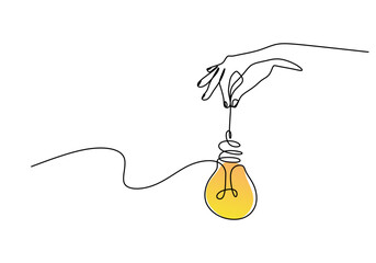 Hand holding a light bulb in one line drawing. Minimalist concept of creative ideas.